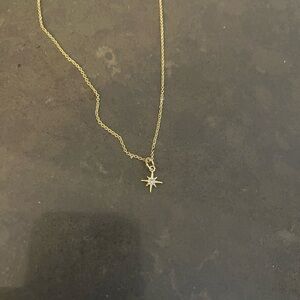 Gold plated 18inch necklace with a removable North Star charm. Never worn.
